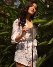 Sexy Malvika Sharma in a White Wrap Style Floral Printed Mini Dress with a Deep Cleavage Photos 03