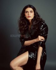 Sexy Model Karishma Tanna in a Black Leather Trench Coat Pictures 01