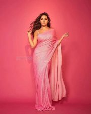 Sexy Nora Fatehi in a Hot Sequin Pink Saree Photos 02