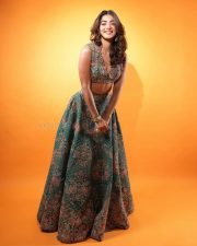 Sexy Pooja Hegde in a Mudra Green Lehenga with Organza Dupatta with Resham and Zardozi Embroidery Plunging Scalloped Neckline Photos 01