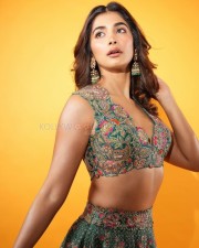 Sexy Pooja Hegde in a Mudra Green Lehenga with Organza Dupatta with Resham and Zardozi Embroidery Plunging Scalloped Neckline Photos 02