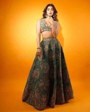 Sexy Pooja Hegde in a Mudra Green Lehenga with Organza Dupatta with Resham and Zardozi Embroidery Plunging Scalloped Neckline Photos 03 Sexy Pooja Hegde in a Mudra Green Lehenga with Organza Dupatta with Resham and Zardozi Embroidery Plunging Scalloped Neckline Photos 03