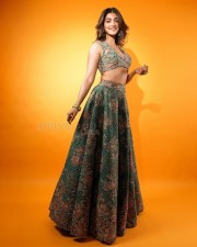 Sexy Pooja Hegde in a Mudra Green Lehenga with Organza Dupatta with Resham and Zardozi Embroidery Plunging Scalloped Neckline Photos 04