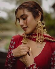 Sexy Priya Prakash Varrier in a Deep Red Printed Salwar Suit Photos 02