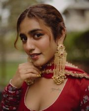 Sexy Priya Prakash Varrier in a Deep Red Printed Salwar Suit Photos 06