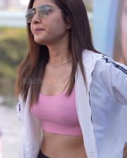 Sexy Raashi Khanna in a Pink Crop Top and White Hoodie Photos 01