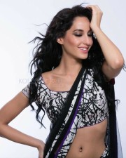 Sexy Singer and Dancer Nora Fatehi Black Saree Photoshoot Pictures 01