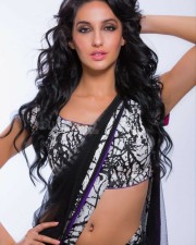 Sexy Singer and Dancer Nora Fatehi Black Saree Photoshoot Pictures 03