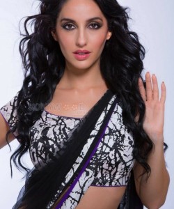 Sexy Singer and Dancer Nora Fatehi Black Saree Photoshoot Pictures 04