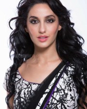 Sexy Singer and Dancer Nora Fatehi Black Saree Photoshoot Pictures 06