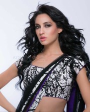 Sexy Singer and Dancer Nora Fatehi Black Saree Photoshoot Pictures 08