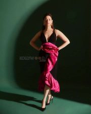 Sexy Tamanna in a Deep Cut Black Rose Dress Photos 01
