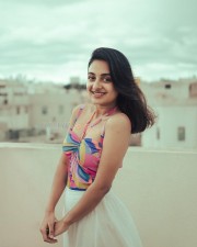 Sizzling Beauty Esther Anil in a Colourful Top and White Skirt Pictures 01