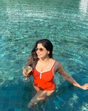 Sizzling Beauty Sakshi Agarwal in a Red Monokini Photos 06
