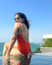 Sizzling Beauty Sakshi Agarwal in a Red Monokini Photos 08