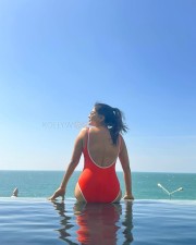 Sizzling Beauty Sakshi Agarwal in a Red Monokini Photos 09