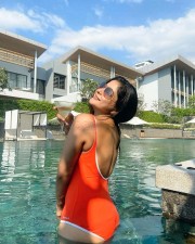 Sizzling Beauty Sakshi Agarwal in a Red Monokini Photos 11