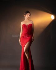 Sizzling Hot Rakul Preet Singh in a Red Corset Strapless Top with a Thigh High Slit Skirt Photos 02