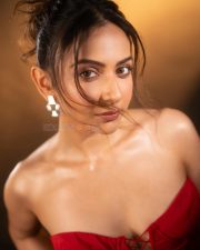 Sizzling Hot Rakul Preet Singh in a Red Corset Strapless Top with a Thigh High Slit Skirt Photos 03
