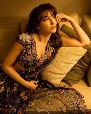 Sizzling Nora Fatehi in a Black Embroidered Saree Photos 01