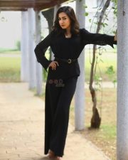 Sophisticated Actress Catherine Tresa in a Black Long Sleeve Wrap Dress Photos 02