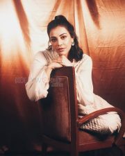 Sophisticated Actress Kajal Aggarwal in a White Puff Sleeve Blouse Photos 05