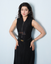 Sophisticated Actress Pranitha Subhash in a Black Zip Front Sleeveless Belted Dress Photos 01