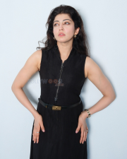 Sophisticated Actress Pranitha Subhash in a Black Zip Front Sleeveless Belted Dress Photos 02