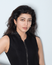 Sophisticated Actress Pranitha Subhash in a Black Zip Front Sleeveless Belted Dress Photos 03