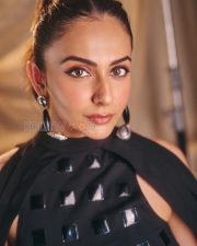 Sophisticated Actress Rakul Preet Singh in a Black Mirror Embellished Halter Dress Photos 01