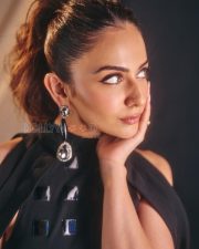 Sophisticated Actress Rakul Preet Singh in a Black Mirror Embellished Halter Dress Photos 03
