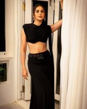 Sophisticated Bollywood Actress Rakul Preet Singh in a Sleeveless Draped Cowl Neck Crop Top with a Mermaid Style Maxi Skirt Photos 05