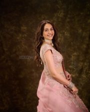 Sophisticated Indian Actress Rakul Preet Singh in a Voluminous Satin Organza Skirt with a Raw Silk Crop Top Blouse Pictures 09