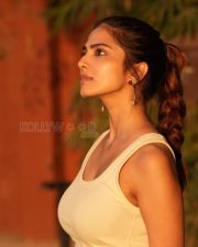 Sophisticated Malavika Mohanan in a Off White Tank Top with a Khaki Bottoms Pictures 02