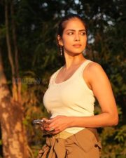 Sophisticated Malavika Mohanan in a Off White Tank Top with a Khaki Bottoms Pictures 03