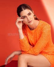 Sparkling Actress Kriti Sanon in an Orange Sequin Mini Dress Photos 06