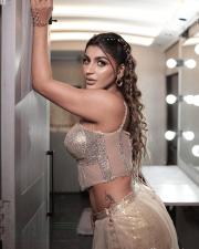 Sparkling Actress Yashika Aannand in a Gold Sequin Corset Lehenga Photos 04