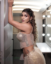 Sparkling Actress Yashika Aannand in a Gold Sequin Corset Lehenga Photos 04