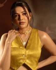 Sparkling Beauty Kajal Aggarwal in a Mustard Crop Top and High Waisted Trousers Photos 03 Sparkling Beauty Kajal Aggarwal in a Mustard Crop Top and High Waisted Trousers Photos 03