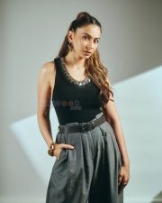 Striking Actress Rakul Preet Singh in a Black ribbed tank top and grey wide leg trousers Photos 03