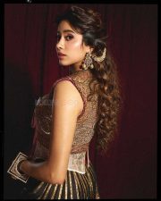 Striking Beauty Janhvi Kapoor in a Manish Malhotra Embellished Corset Top with Cleavage Neckline and a Long Black Skirt Pictures 02