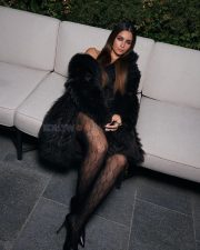Stunning Alia Bhatt at New Year Fashion Week in a Nude Satin Mini Dress with a Black Fur Coat Photos 01