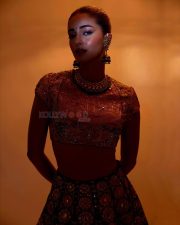 Stunning Ananya Panday in a Black Hand Embroidered Lehenga with a High Neck Mustard Yellow Blouse Photos 08 Stunning Ananya Panday in a Black Hand Embroidered Lehenga with a High Neck Mustard Yellow Blouse Photos 08