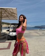 Stunning Ananya Panday in a Vibrant Pink and Orange Monokini with Waist Cutout Stills 03