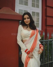 Stunning Anikha Surendran in a White Saree with an Orange Border Pictures 02