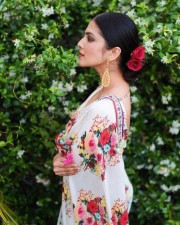 Stunning Beauty Malavika Mohanan in a White Floral Monochromatic Saree with Sleeveless Blouse Photos 01 Stunning Beauty Malavika Mohanan in a White Floral Monochromatic Saree with Sleeveless Blouse Photos 01