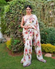 Stunning Beauty Malavika Mohanan in a White Floral Monochromatic Saree with Sleeveless Blouse Photos 04