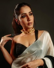 Stunning Beauty Raashi Khanna in a Black and White Saree with an One Shoulder Blouse Photos 07