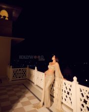 Stunning Bollywood Beauty Janhvi Kapoor in a Manish Malhotra Body Hugging Lehenga with an Off Shoulder Blouse and Sheer Dupatta Photos 01