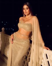 Stunning Bollywood Beauty Janhvi Kapoor in a Manish Malhotra Body Hugging Lehenga with an Off Shoulder Blouse and Sheer Dupatta Photos 02
